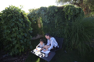 Mother and a son playing games at home