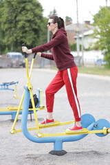 Fototapeta premium Woman exercising or doing workout session outside