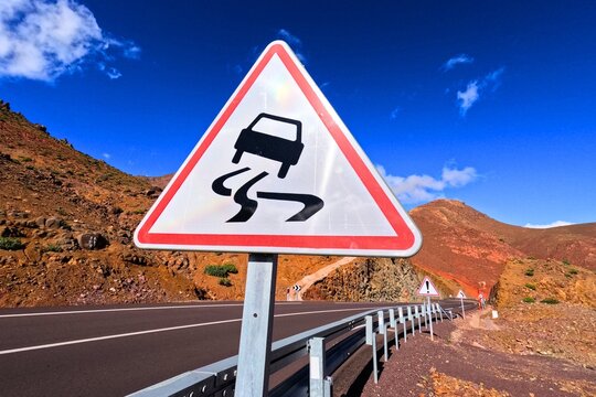 Slippery Road Warning Traffic Sign