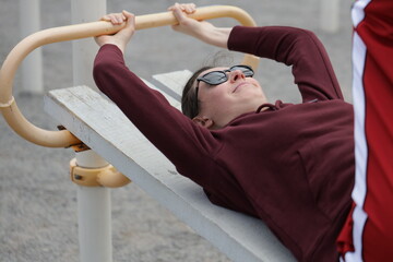 Woman exercising or doing workout session outside