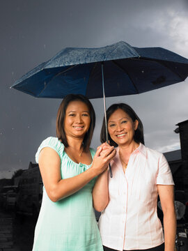 Portrait of Mother and Daughter in Rain