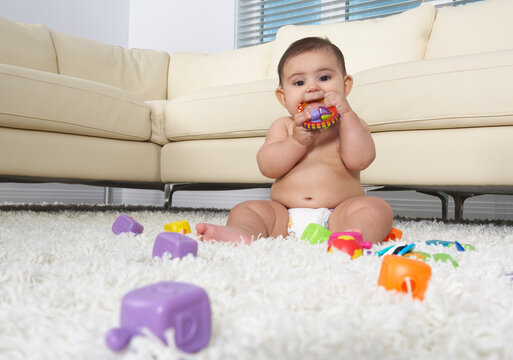 Baby Playing With Toys