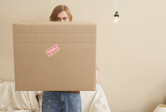 Man Lifting Box