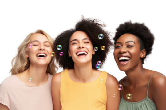 Two women with joyful expressions playfully blowing bubbles together isolated on white background