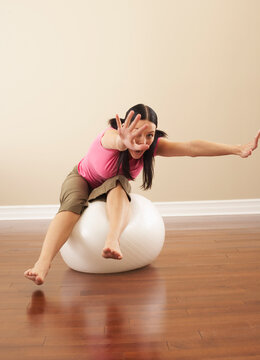 Woman on Exercise Ball
