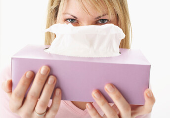 Woman Holding Box of Tissue