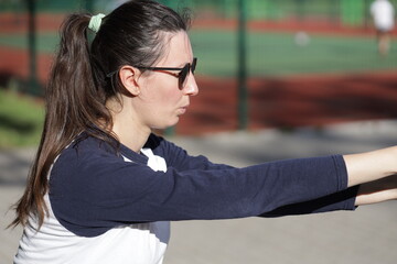 Woman exercising or doing workout session outside