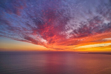 Dramatic colorful sunset over the Atlantic Ocean. Algarve, Portugal