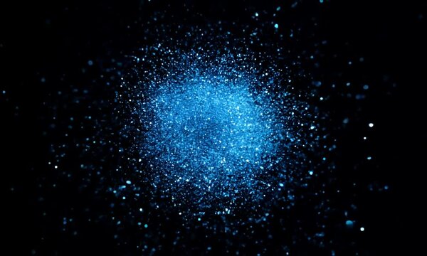 Cosmic Dust: A mesmerizing abstract image of blue particles scattered on a black background, evoking the beauty and mystery of the cosmos.  