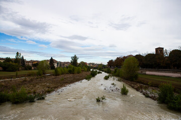 A rushing river in winter floods the city, creating stunning views and highlighting the raw power...