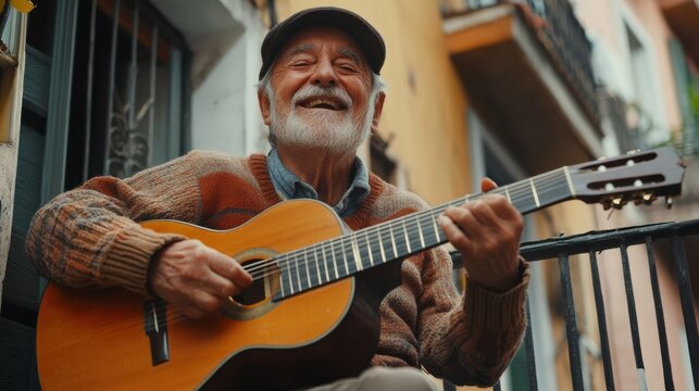 Elderly man playing guitar outdoors in a vibrant neighborhood