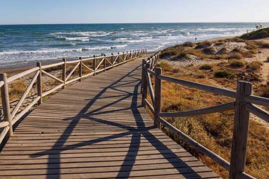 Boardwalk at Artola beach in Costa del Sol, Malaga, Southern Spain