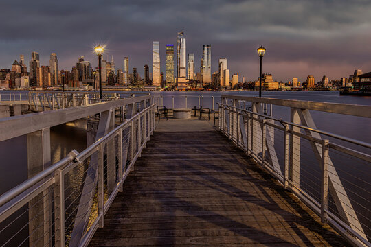 Midtown Manhattan skyline at twilight viewed from Weehawken Pier, New Jersey, USA; Weehawken, New Jersey, United States of America