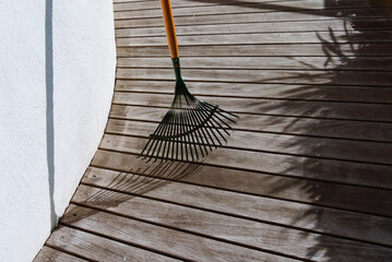 Leaf Rake Glowing in Sunlight: A Glimpse of Autumn