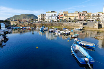 Boats in the ancient port of Pozzuoli in Italy.