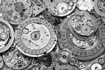Old mechanical watches with gears and cogs. Watch or clock mechanisms