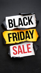 Black Friday sale announcement with torn yellow paper accents for attention-grabbing retail offers