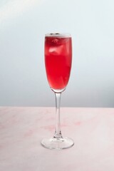 Red Cocktail with Straw and Fresh Strawberry