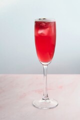 Red Cocktail with Straw and Fresh Strawberry