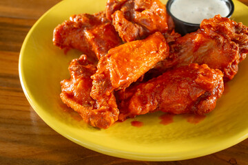 A view of a plate of Buffalo wings.