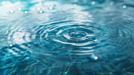 Obraz premium Blue mint water surface with delicate rings and waves