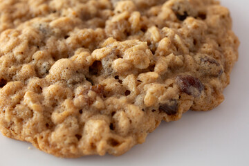 A closeup view of an oatmeal raisin cookie.