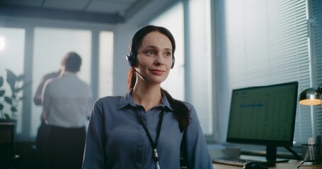 Call center office: Close up portrait of friendly Caucasian female technical customer support...