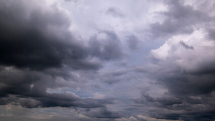 Fototapeta premium Dark sky with stormy clouds. Dramatic sky rain,Dark clouds before a thunder-storm.