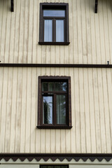 Obraz premium Old wooden windows house exterior.