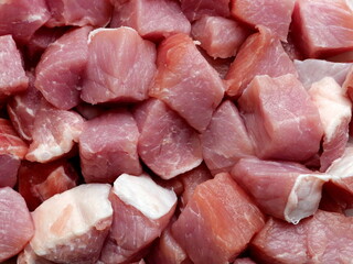 fresh pork goulash cubes. The detailed image is an invitation to cook and is ideal for cookbooks or food blogs.