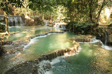 Emerald green water in the many pools of the Kuang Si Falls, Waterfalls, close to Luang Prabang, Laos