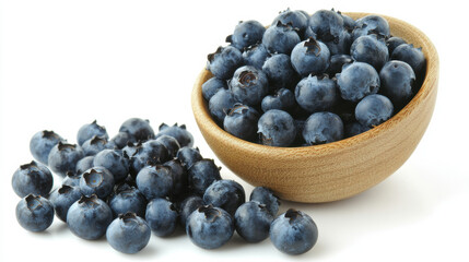 small bowl of blueberries spilling slightly over edge, showcasing vibrant blue color and plump texture of fruit