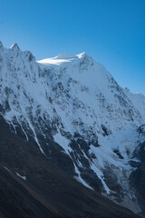 View of the Lötschental valley and glacier in autumn with snow covered peaks in Valais, Switzerland