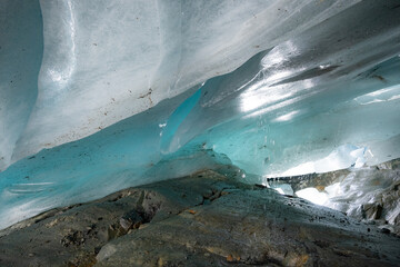 Ice cave in the glacier of Langgletscher at Lötschental in Wallis, Switzerland