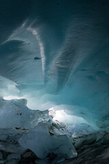 Ice cave in the glacier of Langgletscher at Lötschental in Wallis, Switzerland
