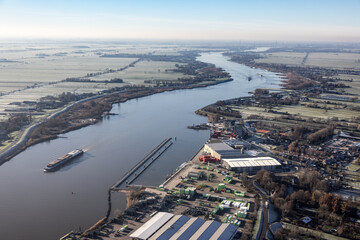 Aerial view Dutch river Lek with view at village Bergambacht