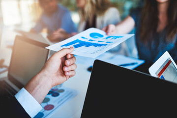 Business people, paperwork and hands with analytics, graph and notes of company sales statistics....