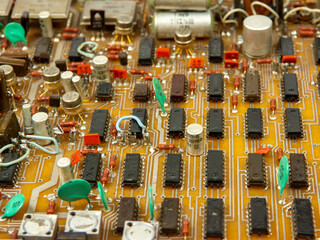 Parts and components on printed circuit boards close-up Electronic board with radio parts from...