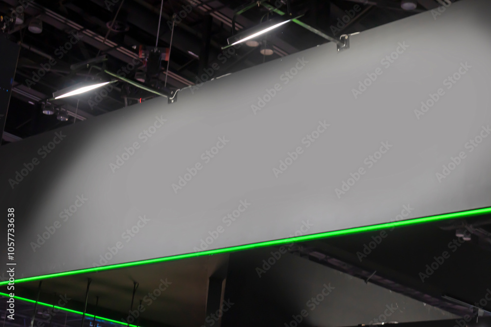 Poster mock up a large brand sign hanging from the ceiling to display an exhibition. mock up a large brand 