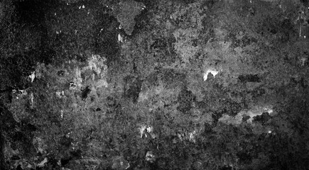 Monochrome backdrop of rusty surface dark gray hues. Black and white grunge rust metal texture. Close-up abstract background of aged old iron, scratch pattern, worn, distress area, corrosion details