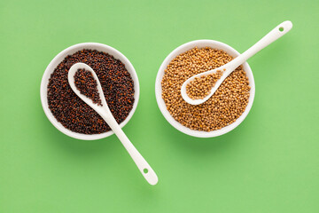 Brown and yellow mustard seeds - Healthy food.