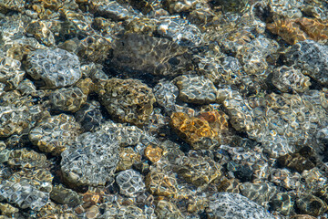 Pure lake water and rocks, san carlos de bariloche, rio negro, argentina