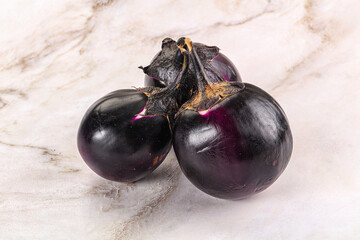 Raw violet and black eggplant