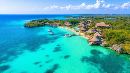 Fototapeta premium Tropical Paradise: An aerial view of a secluded island resort nestled amidst crystal-clear turquoise waters and lush greenery, offering a glimpse of paradise. 