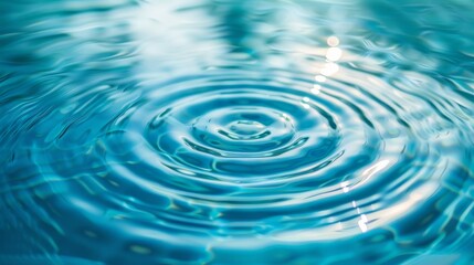Smooth blue mint water texture with circular ripples
