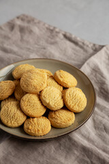 Homemade Cookies with Limoncello and candied lemon paste on a plate. Pasticcini al Limoncello