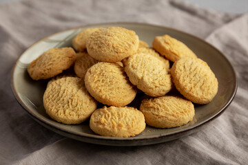 Homemade Cookies with Limoncello and candied lemon paste on a plate. Pasticcini al Limoncello