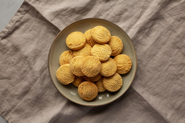 Homemade Cookies with Limoncello and candied lemon paste on a plate. Pasticcini al Limoncello