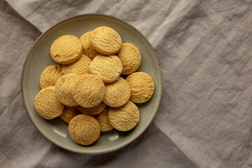 Homemade Cookies with Limoncello and candied lemon paste on a plate. Pasticcini al Limoncello