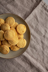 Homemade Cookies with Limoncello and candied lemon paste on a plate. Pasticcini al Limoncello